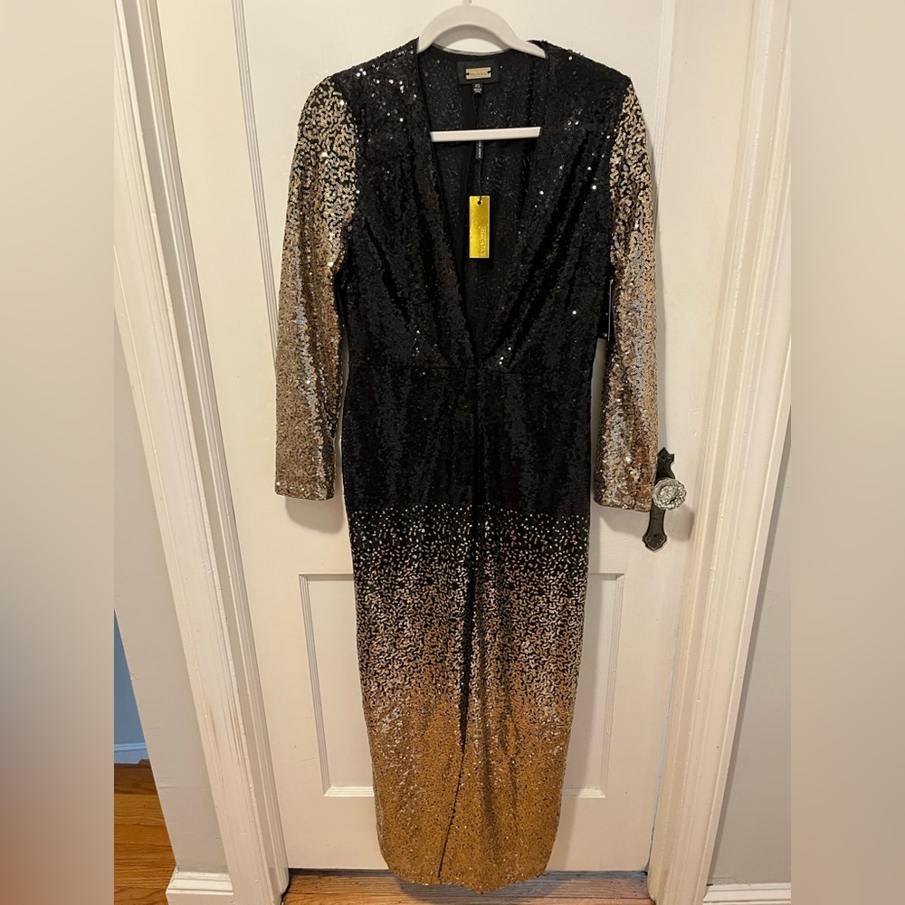Long sleeve glitter, shirt has hook up the front